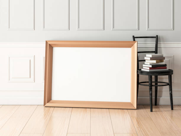 istock Golden horizontal poster Frame Mockup standing on the floor with chair in empty modern interior 1148402859