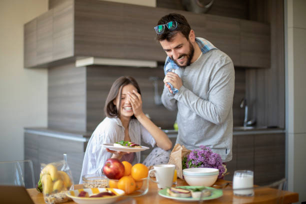 istock Young couple having vegan breakfast in dining room 1148405876
