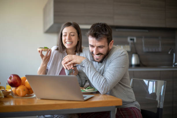 istock Young couple having vegan breakfast in dining room 1148406872
