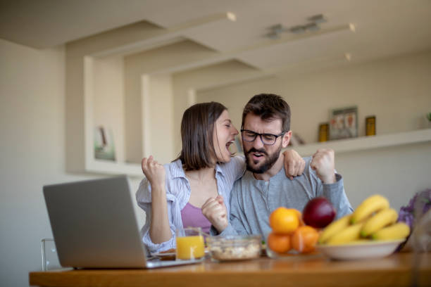 istock Young couple having vegan breakfast in dining room 1148407435
