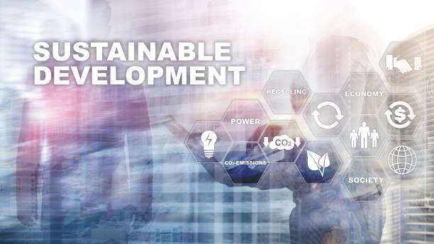 istock Sustainable development, ecology and environment protection concept. Renewable energy and natural resources. Double exposure of success businessman with abstract building. 1148409271