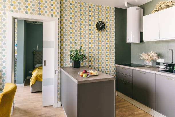 istock Scandinavian interior design. White grey yellow green color kitchen room organization 1148409433