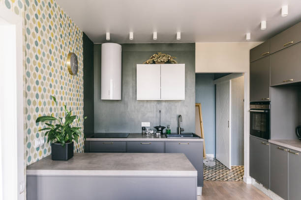 istock Scandinavian interior design. White grey yellow green color kitchen room organization 1148409564