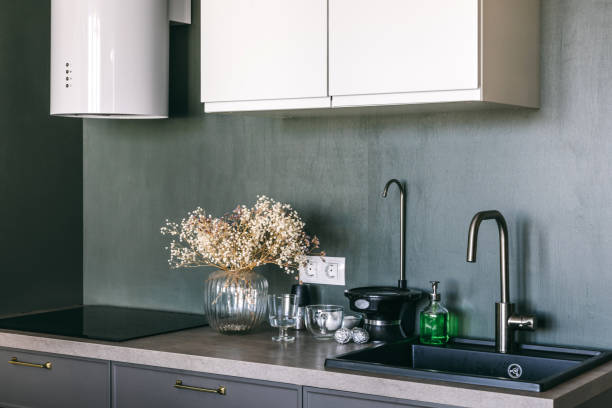 istock White grey kitchen room organization. Pure water and clear sink 1148409638