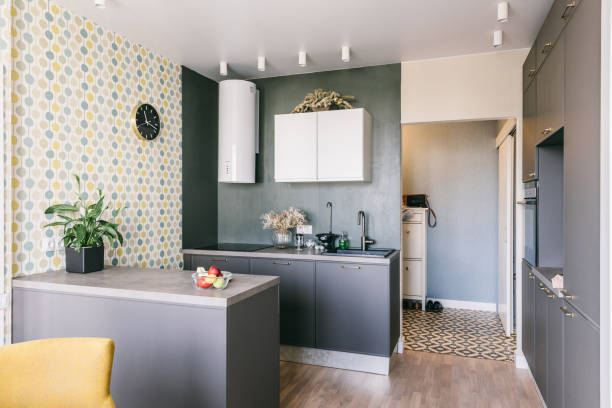istock Scandinavian interior design. White grey yellow green color kitchen room organization 1148409687