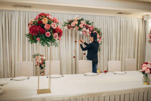 istock Woman making decoration for wedding 1148412123