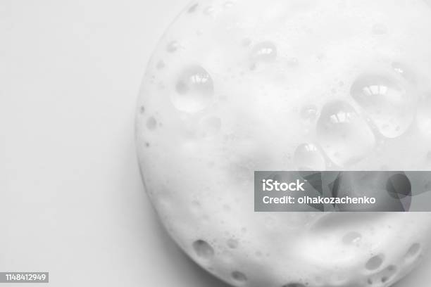 White Foam Texture From Soap Shampoo Or Cleanser On White Background Clouse Up Macro Stock Photo - Download Image Now