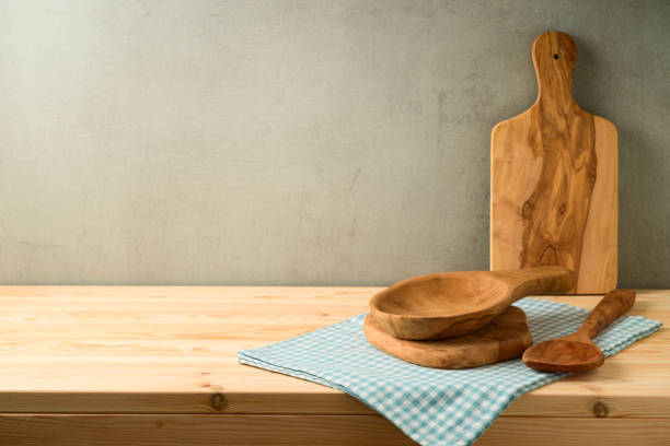 istock Kitchen olive wood utensils on wooden table. 1148416815