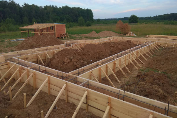 istock Wooden formwork concrete strip foundation for a cottage 1148417191