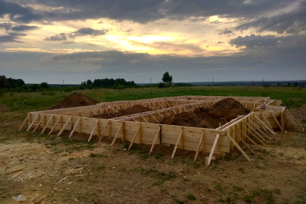 istock Wooden formwork concrete strip foundation for a cottage 1148417207