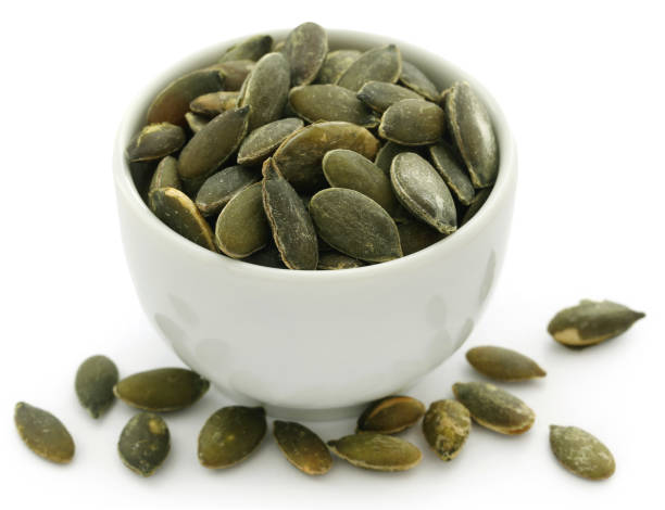 istock Pumpkin seeds roasted and salty 1148419392