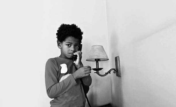 Little child on the phone. Black and white
