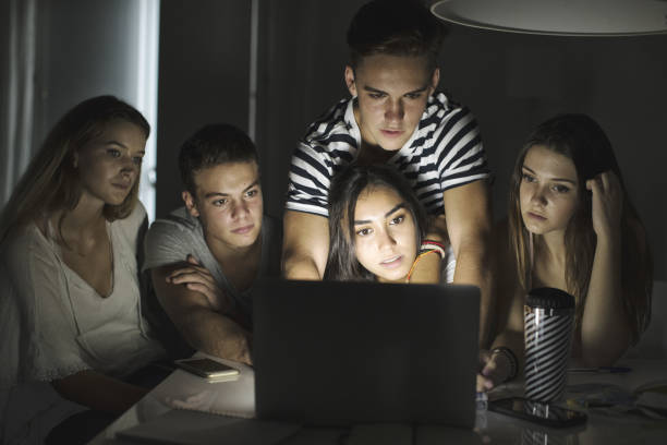 istock Friends together watching a video at home 1148421137