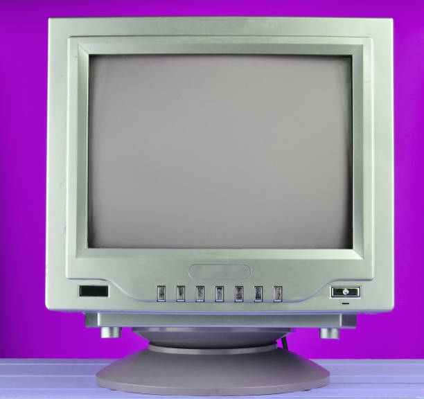 istock Retro TV from 80s close-up on purple background. 1148424078