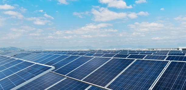 istock Group of solar panels against blue sky 1148427022