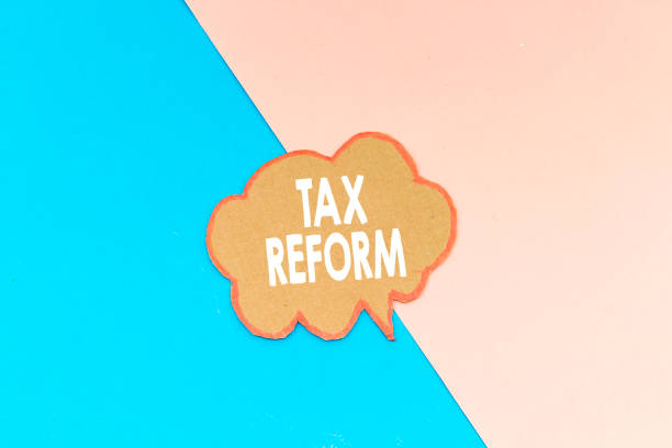 istock tax reform speech bubble isolated on pink and blue background 1148429316