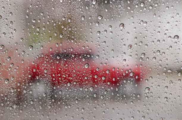 istock Raindrops on the window glass in the summer day 1148429496