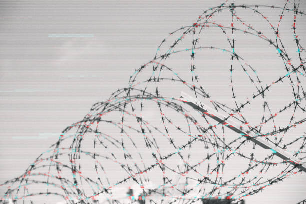 istock glitch abstract fence barbed wire wallpaper backdrop background 1148430314