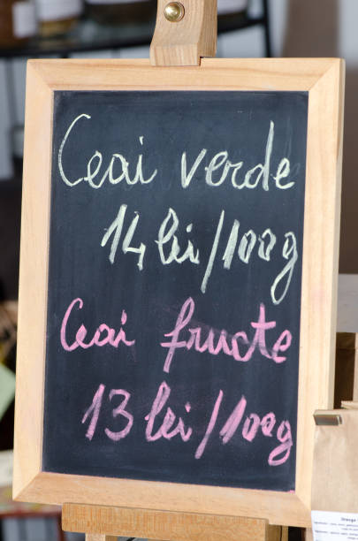 istock Blackboard advertising different assortments of tea in Romanian 1148430988