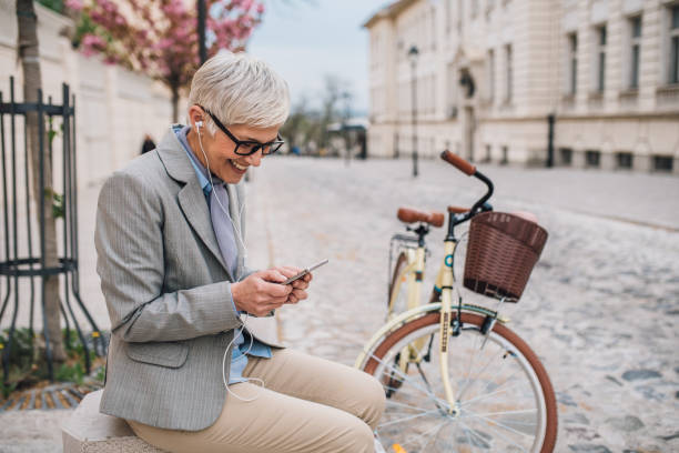 istock Mature woman text messaging 1148433447