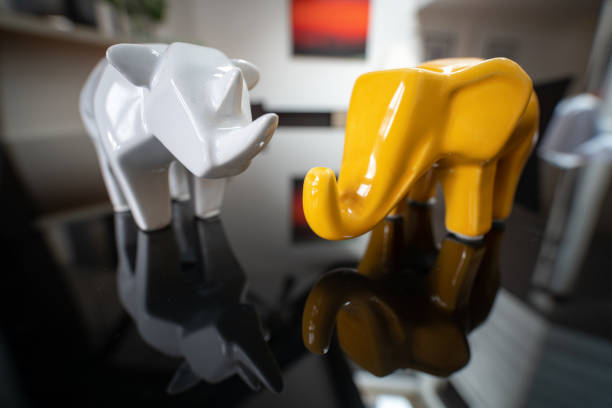 Animals in porcelain with reflection on a table