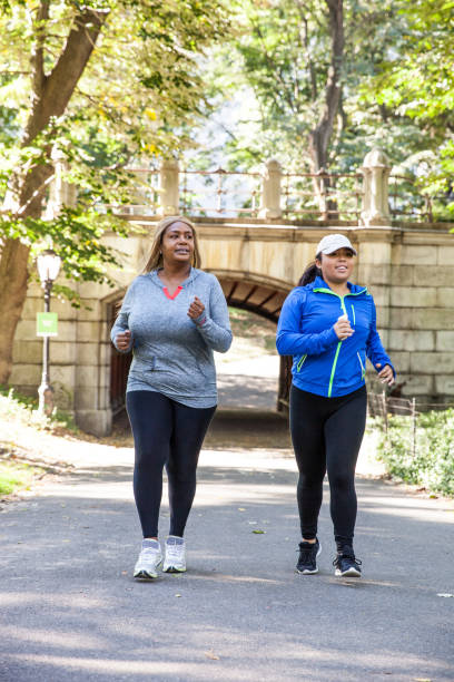 istock Woman exercising outdoors 1148443194