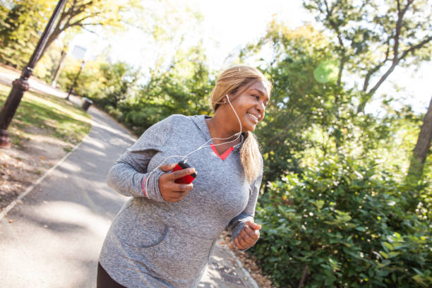 istock Woman exercising outdoors 1148443195
