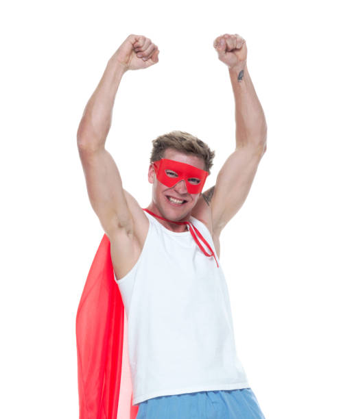 istock Man wearing pajamas and super hero cape 1148447044