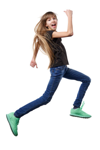 istock Girl running jumping in air over white background 1148448571