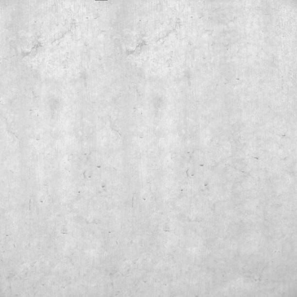 istock Concrete wall in square format 1:1st white grey structure. Rough concrete wall with rough patterns and traces of wear. Structured stone wall in industrial design. 1148452298