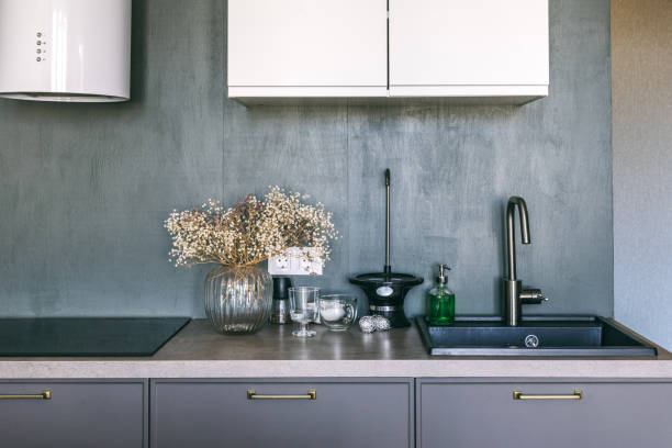 istock White grey kitchen room organization. Pure water and clear sink 1148455165