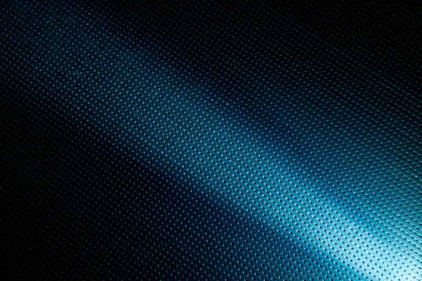 istock Narrow white light beam on a dark blue background to the point 1148458120