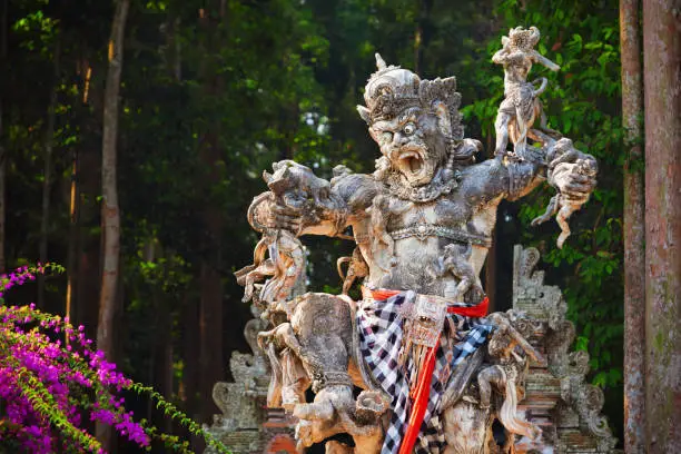 Photo of Ancient statue of Kumbhakarna in Sangeh Monkey Forest, Bali, Indonesia