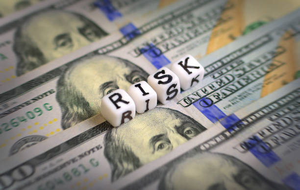 istock Money risk concept with dollar bills and cubes with 