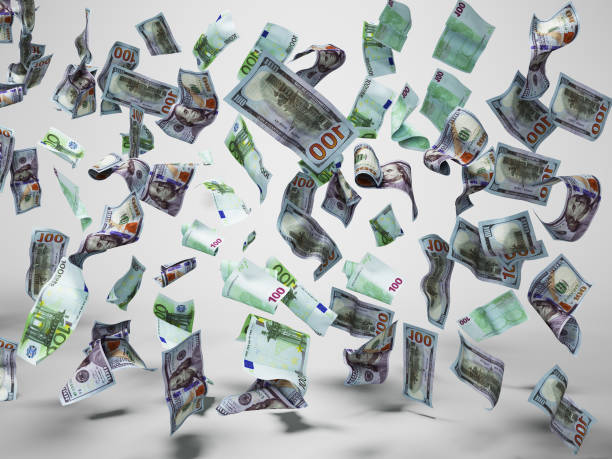 istock New one hundred dollars and one hundred euro banknotes fall on the floor 3d render on gray background with shadow 1148472885