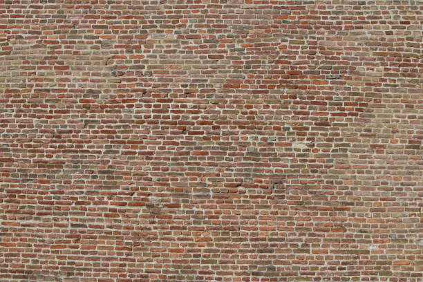 Old red brick wall background texture Old red brick wall background texture brown bricks stock pictures, royalty-free photos & images