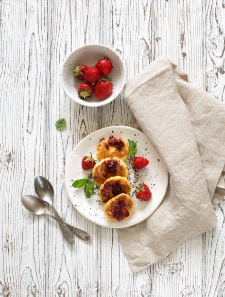 istock Cottage cheese pancakes and fresh strawberries 1148491545