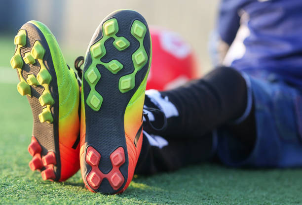 istock Child wearing football boots 1148500339