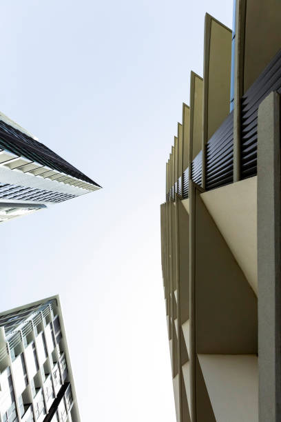 istock Low angle view of modern apartment buildings, sky background with copy space 1148502689