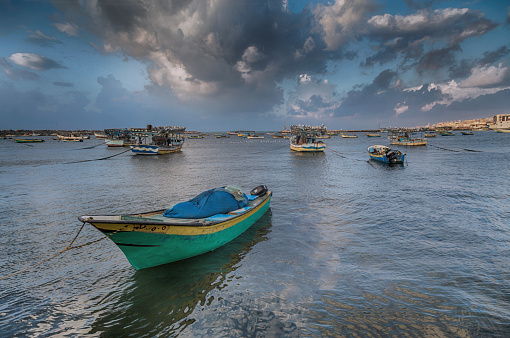 A photo of Palestinian fishing boats.\nGaza City, Palestine.