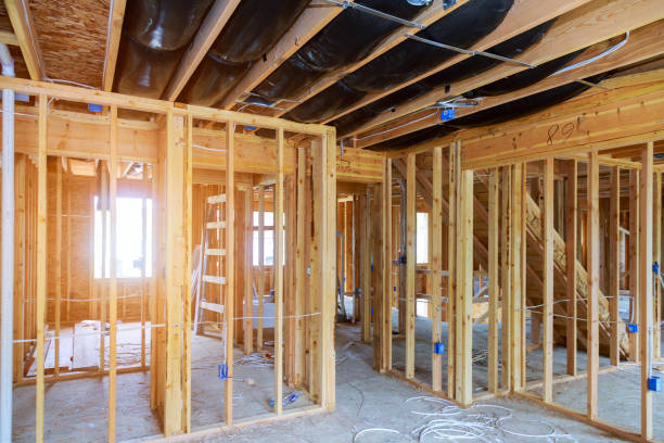 Interior stick built frame of a new house under construction Interior stick modern building framing of a new house under construction contracting stock pictures, royalty-free photos & images