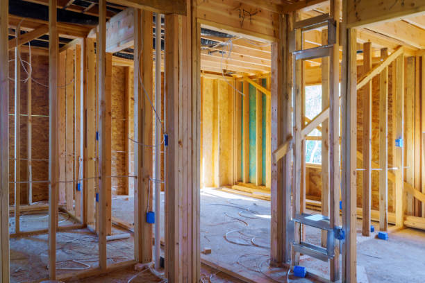 istock Home Framing unfinished wood frame building or a house 1148509117