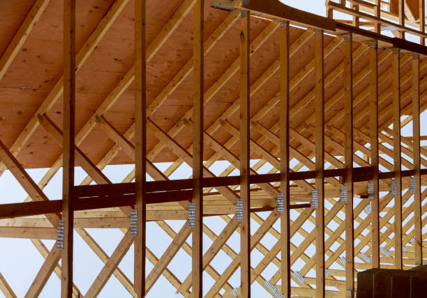 istock House construction with wood framing roof trusses 1148509118