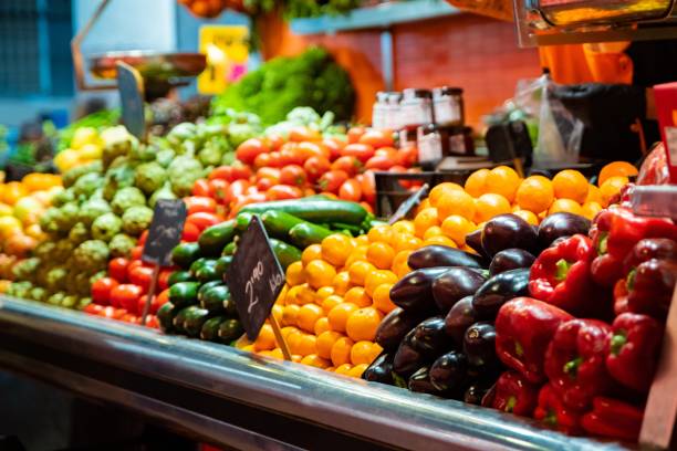 istock Vegetable stall on bazaar with colorful vegetables and fruits 1148511780