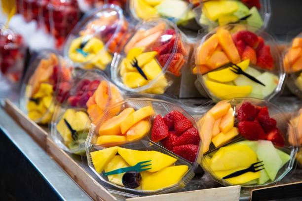 istock Fresh fruits snacks on market stall 1148511821