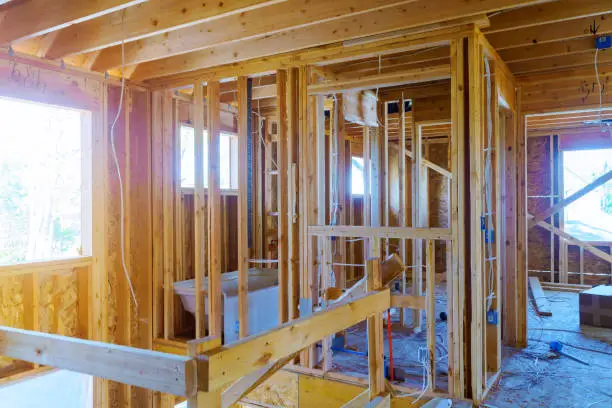 A new home under construction interior inside a house frame