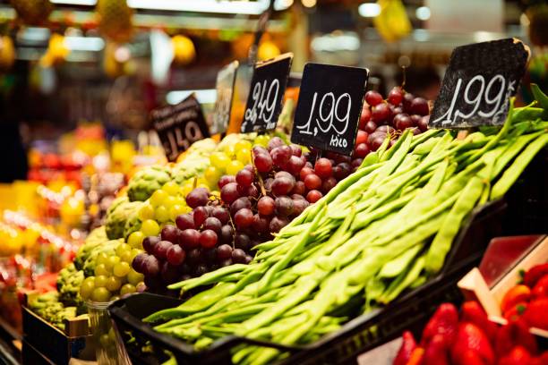istock Vegetable stall on bazaar with colorful vegetables and fruits 1148511853