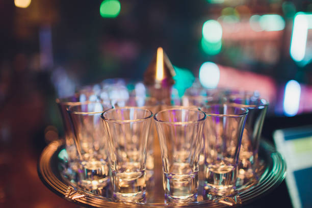 istock Empty shot glasses on bar counter selective focus. 1148520590
