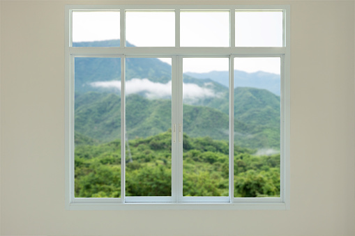 Modern house window view with mountain background