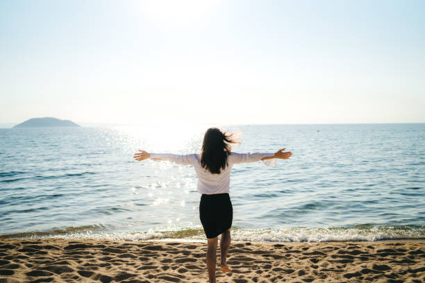 istock Businesswoman on the beach 1148523269